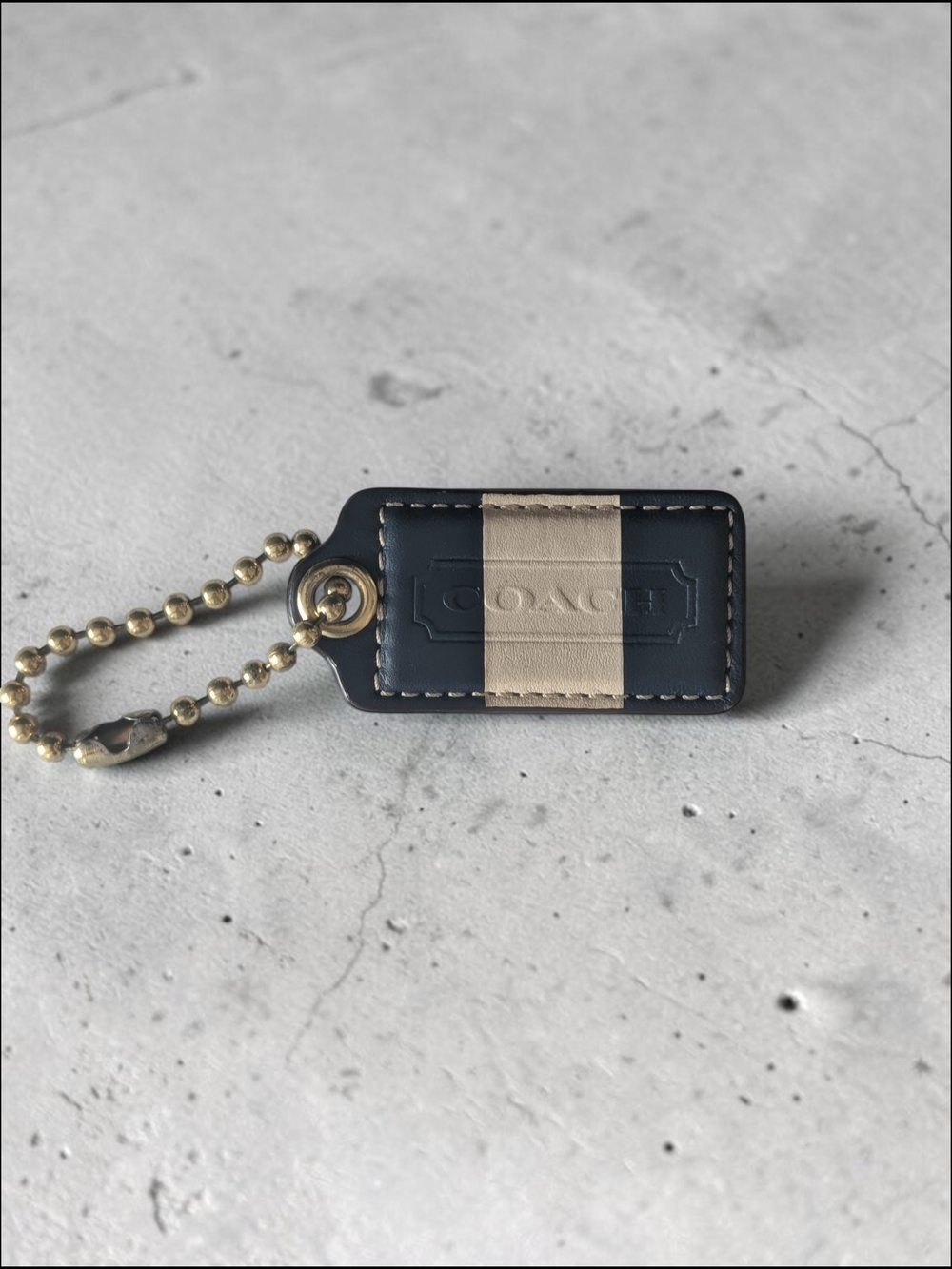 Coach Vintage 2.5" Blue and Beige Embossed Leather Hangtag